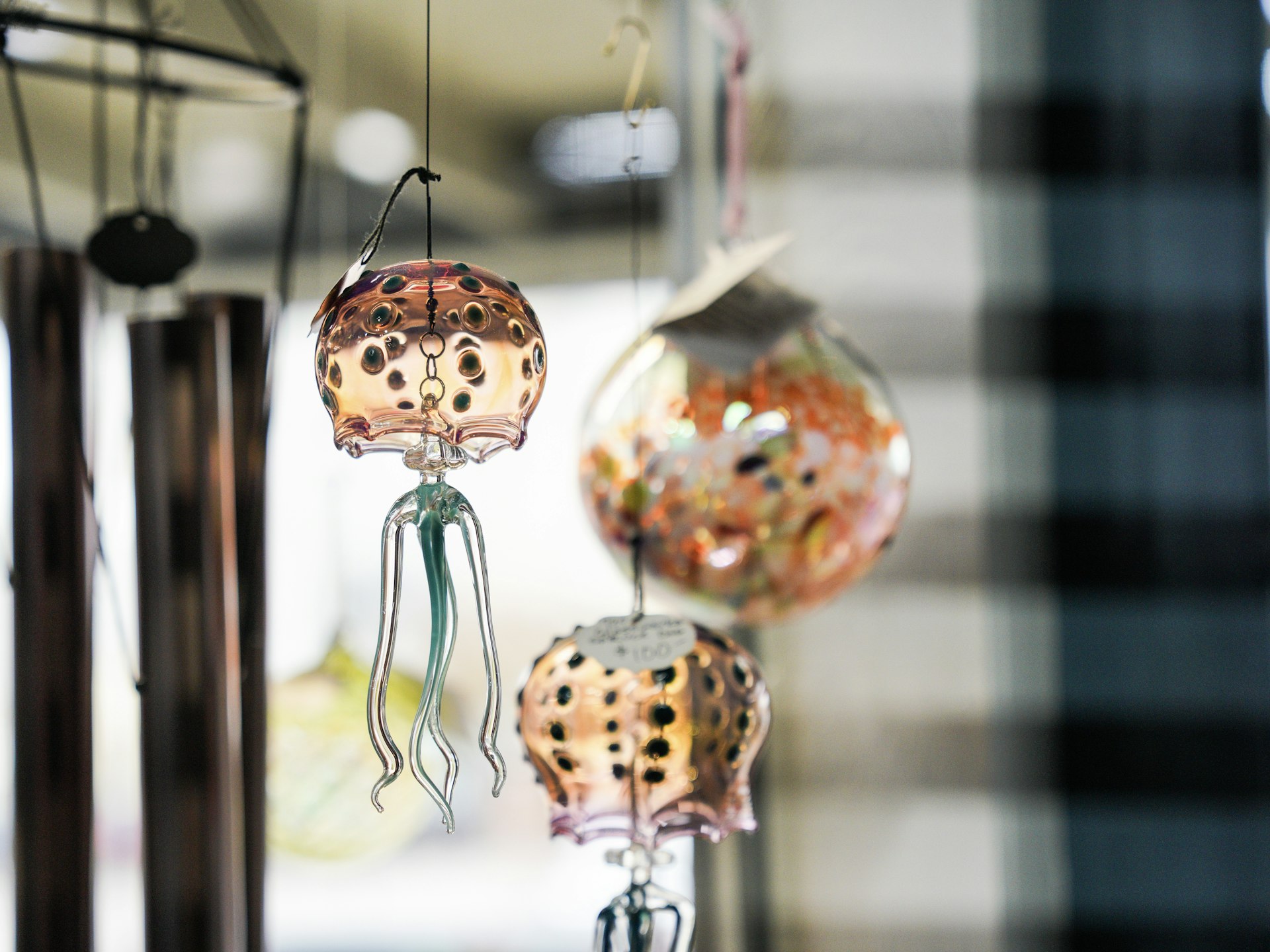 Hand-blown glass jellyfish ornaments at Brazos Glassworks